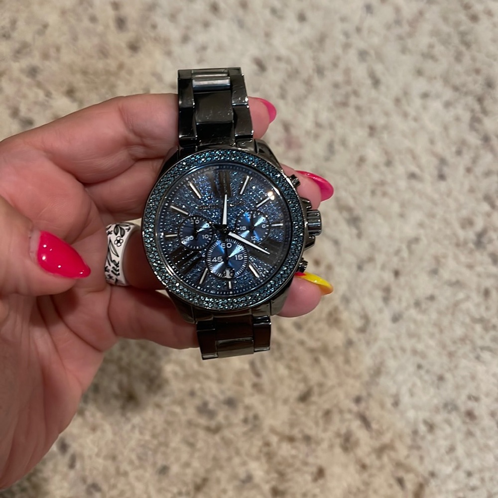 Michael kors gun metal watch. Blue crystal face.
